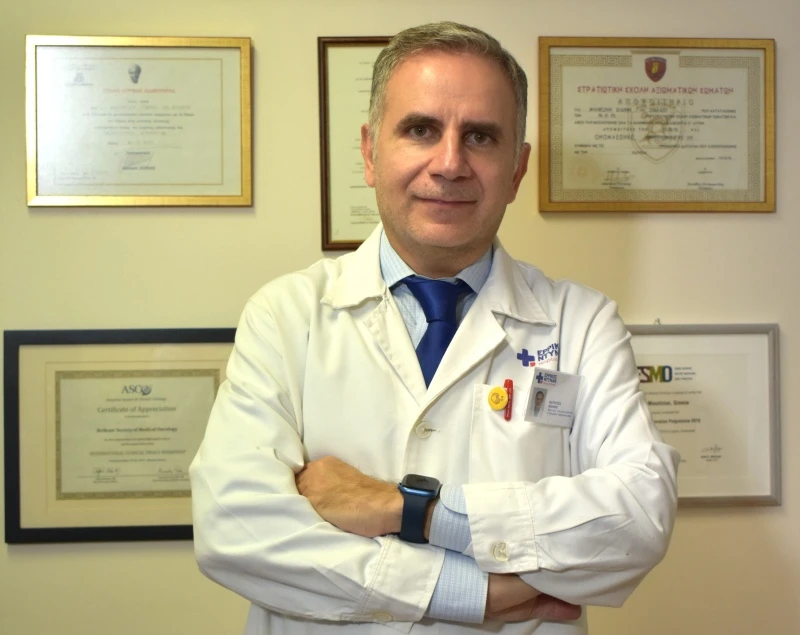 Ιωάννης Μούντζιος, MD, MSc, PhD Παθολόγος Ογκολόγος Διευθυντής της Δ΄ Ογκολογικής Κλινικής και Μονάδας Κλινικών Μελετών στο Νοσοκομείο Ερρίκος Ντυνάν Ιωάννης Μούντζιος, MD, MSc, PhD Παθολόγος Ογκολόγος Διευθυντής της Δ΄ Ογκολογικής Κλινικής και Μονάδας Κλινικών Μελετών στο Νοσοκομείο Ερρίκος Ντυνάν